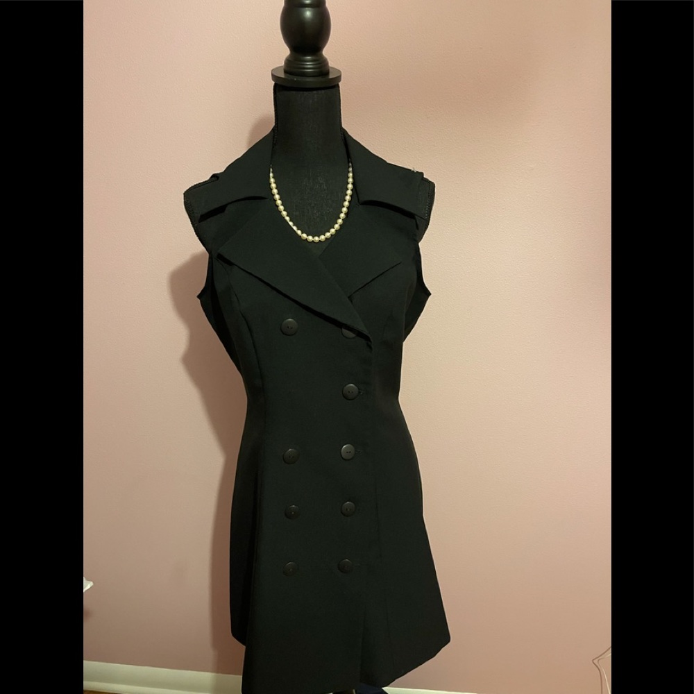 Very cute dress  it has buttons on the front